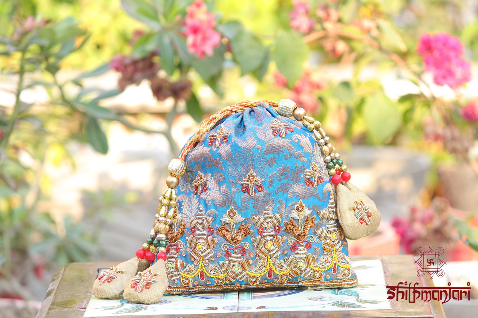 Luxury Sky Blue Brocade Embroidered Potli Bag with Zari & Multicolor Bead Tassel Work (Designer Ethnic Clutch)