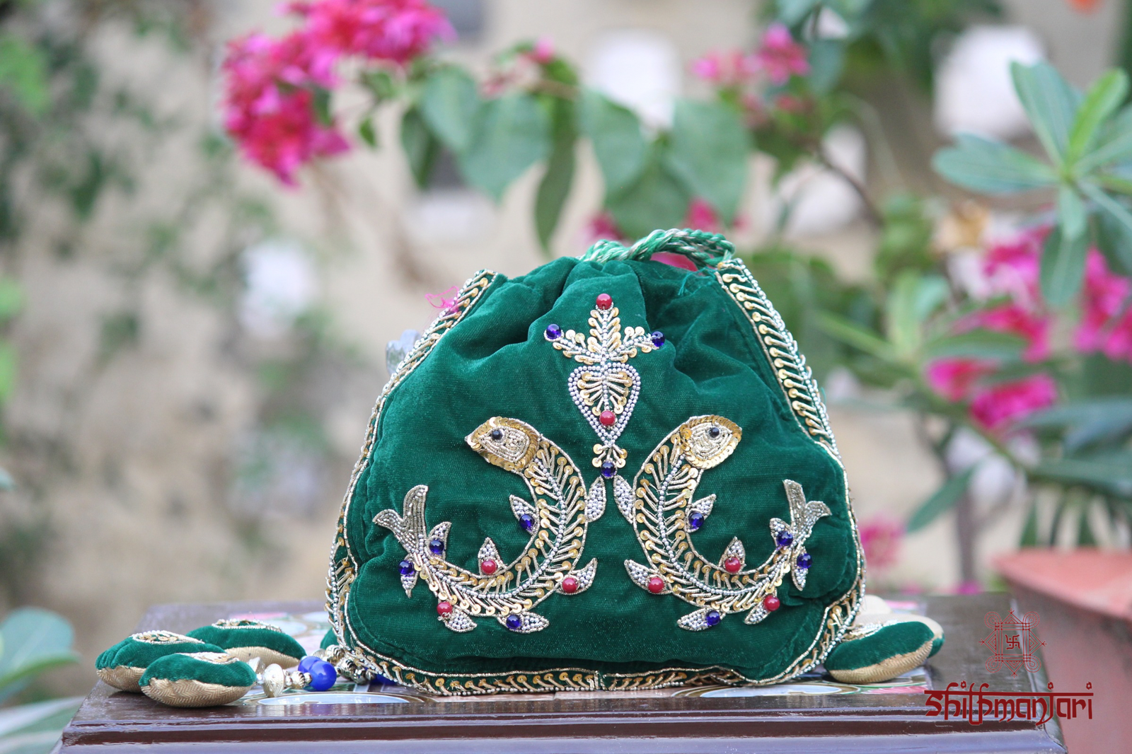 Royal Emerald Green Velvet Potli Bag with Intricate Zari Peacock Embroidery & Multicolor Stone Detailing (Luxury Ethnic Clutch)