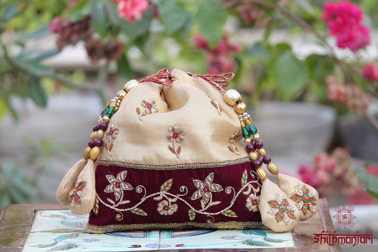 Royal Beige & Maroon Velvet Potli Bag with Intricate Zari Floral Embroidery & Multicolor Bead Tassel Detailing (Luxury Ethnic Clutch)